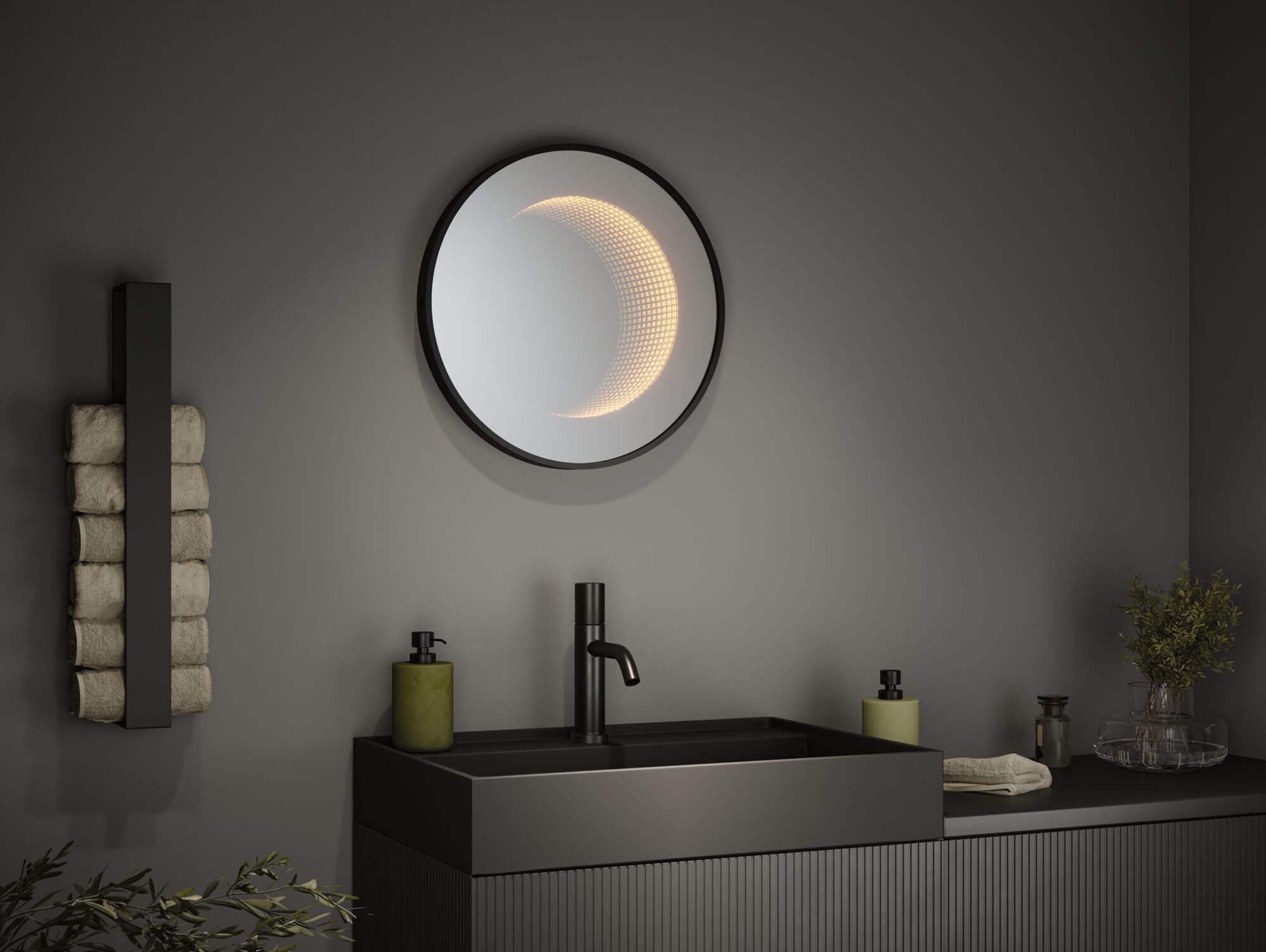 Miroir mural rond de salle de bain avec éclairage LED intégré noir, design moderne avec lavabo et robinet.