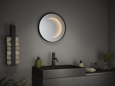 Miroir mural rond de salle de bain avec éclairage LED intégré noir, design moderne avec lavabo et robinet.