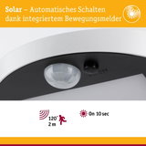 Nahaufnahme eines weißen Solar-Bewegungsmelders mit 120° Erfassungswinkel und 2 m Reichweite