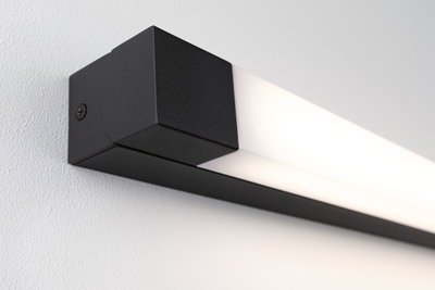 Black LED wall light with matte aluminum housing and white diffuser for modern indoor lighting