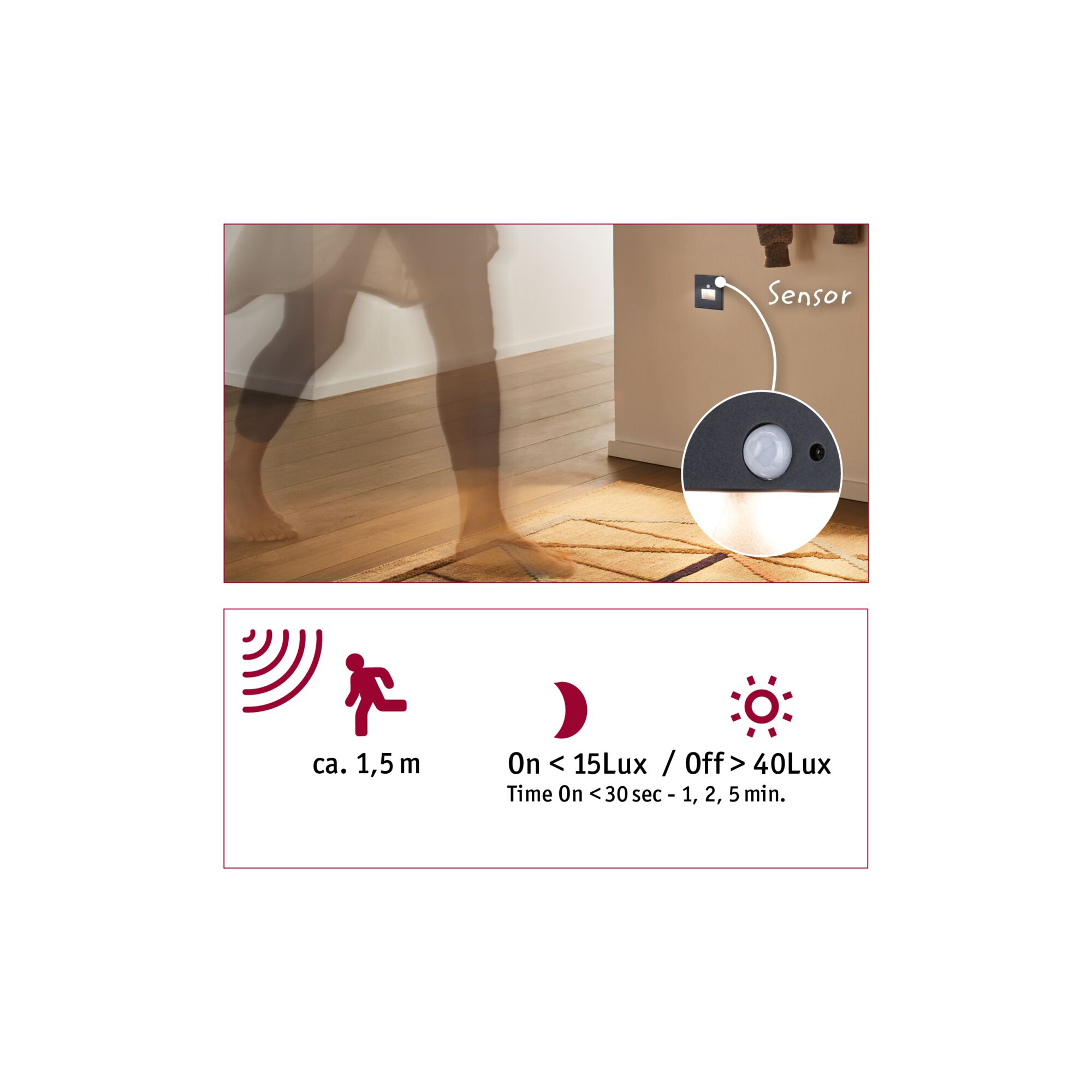 Black motion sensor mounted on wall above rug for automatic light control in hallway or room