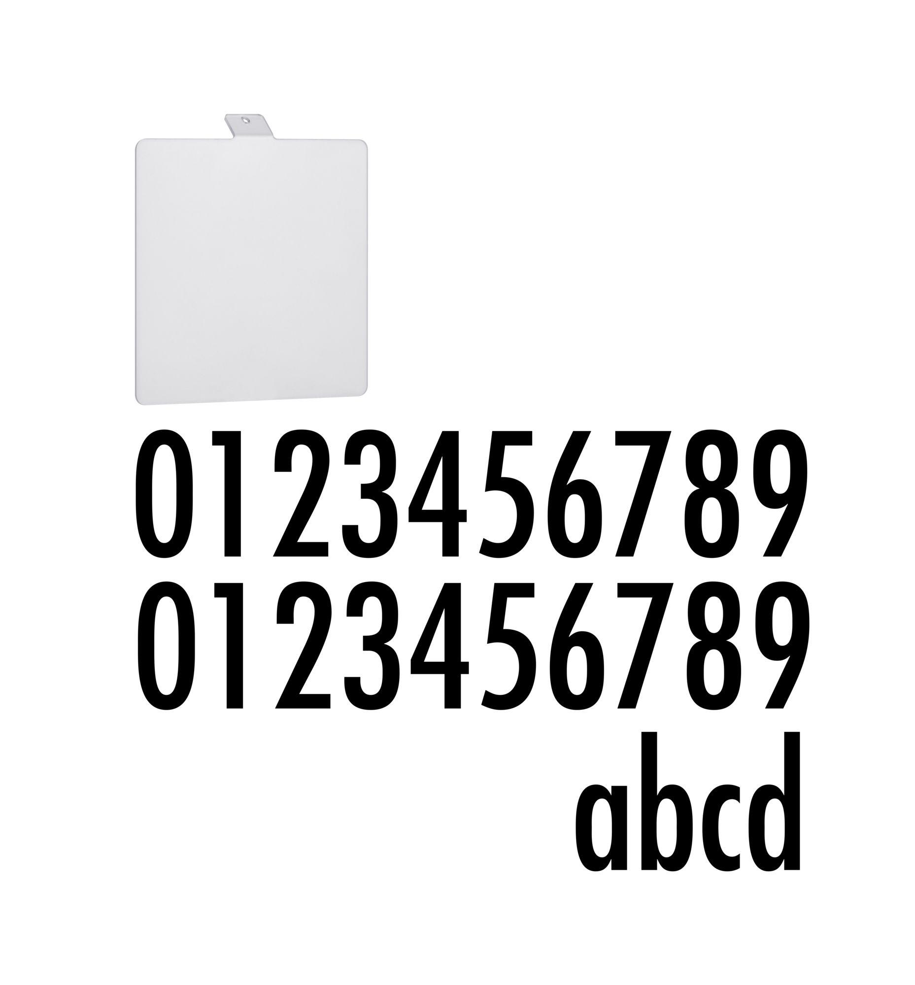 White square plastic plate with black numbers and letters as font sample.
