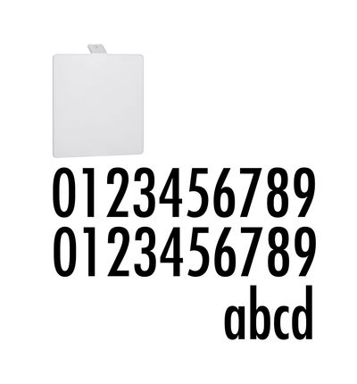 White square plastic plate with black numbers and letters as font sample.
