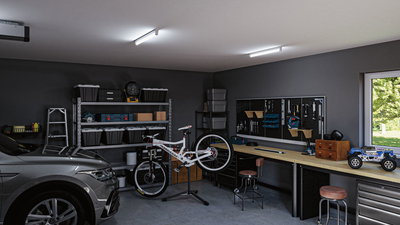 Modern garage with grey car, bike on repair stand, organized workbench and bright LED ceiling lights