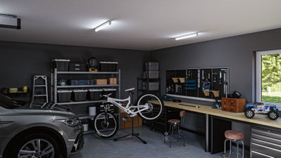Moderne Garage mit grauem Auto, Fahrrad auf Reparaturständer und gut organisierter Werkbank mit LED-Deckenleuchten