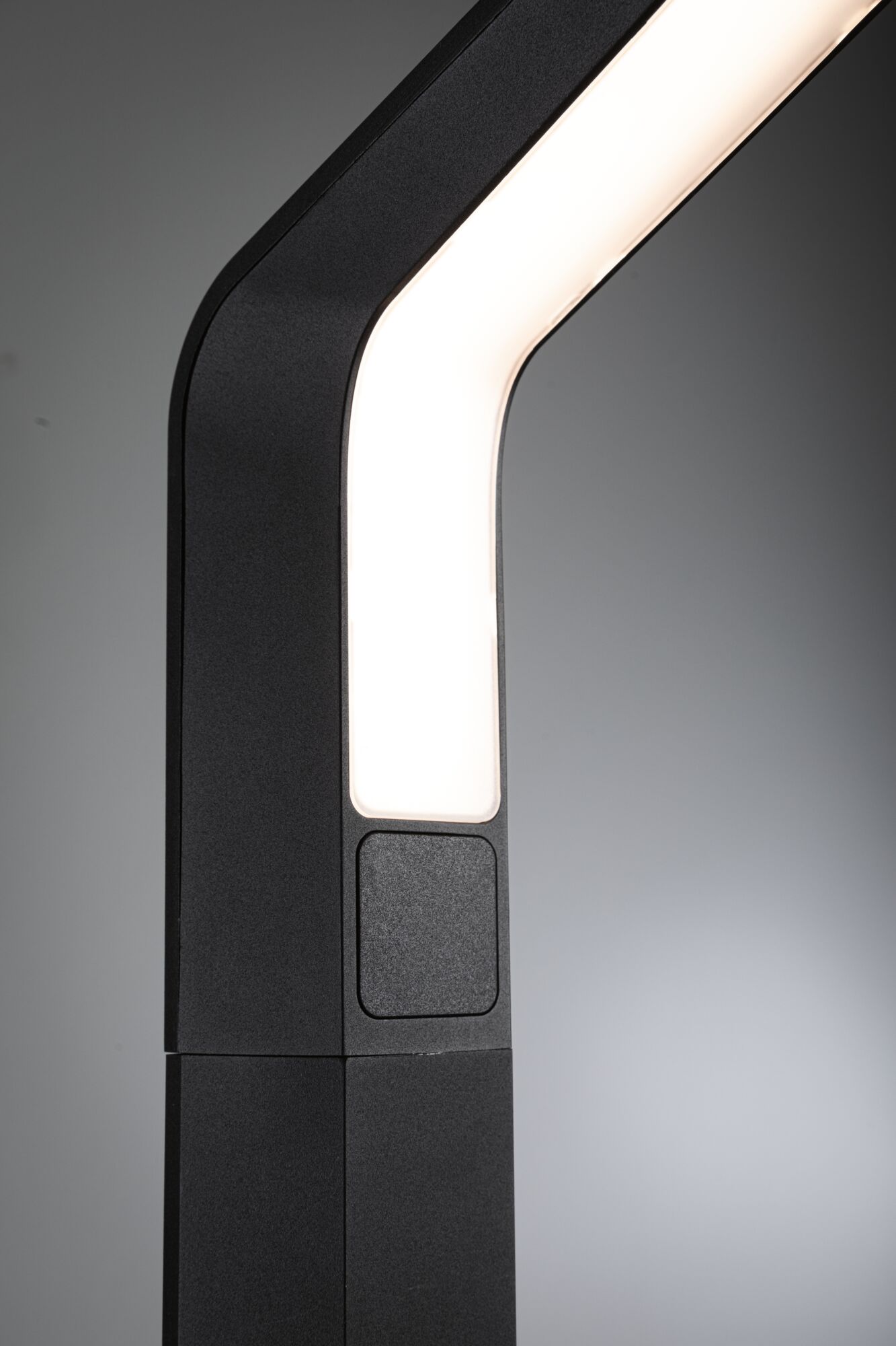 Black LED outdoor lamp with curved design and built-in switch for modern garden lighting