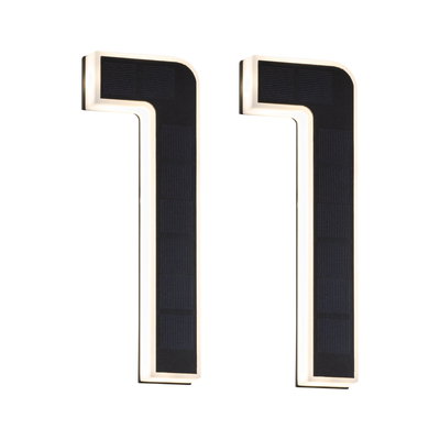Two black L-shaped solar lights with white LED frame for energy-saving outdoor lighting