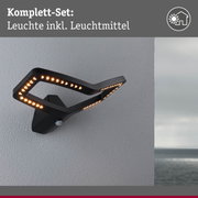 Schwarze LED-Wandleuchte mit modernem Design und warmweißem Licht für Außenbereiche.