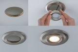 Four images of brushed stainless steel recessed light during installation and lit state
