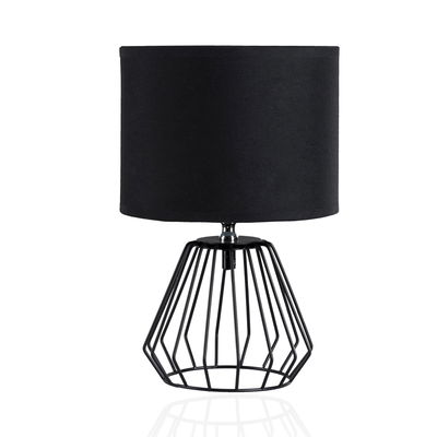 Modern table lamp with black fabric shade and geometric metal base for stylish lighting
