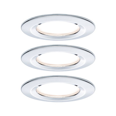 Three round recessed lights with chrome metal frame and warm white LED light for indoor use