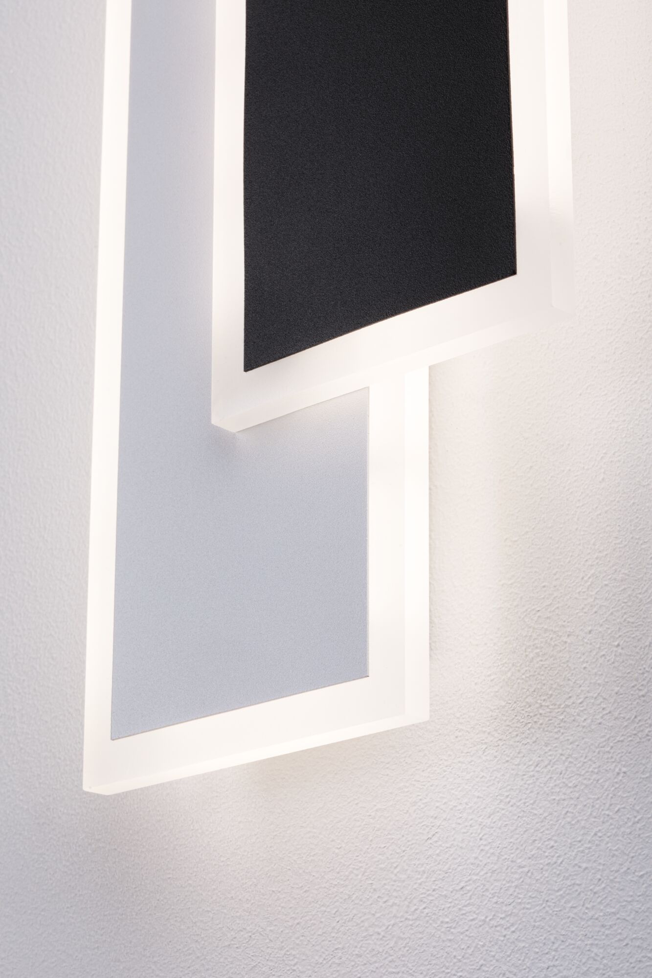 Modern LED wall light with two rectangular panels in black and grey, energy-efficient lighting solution
