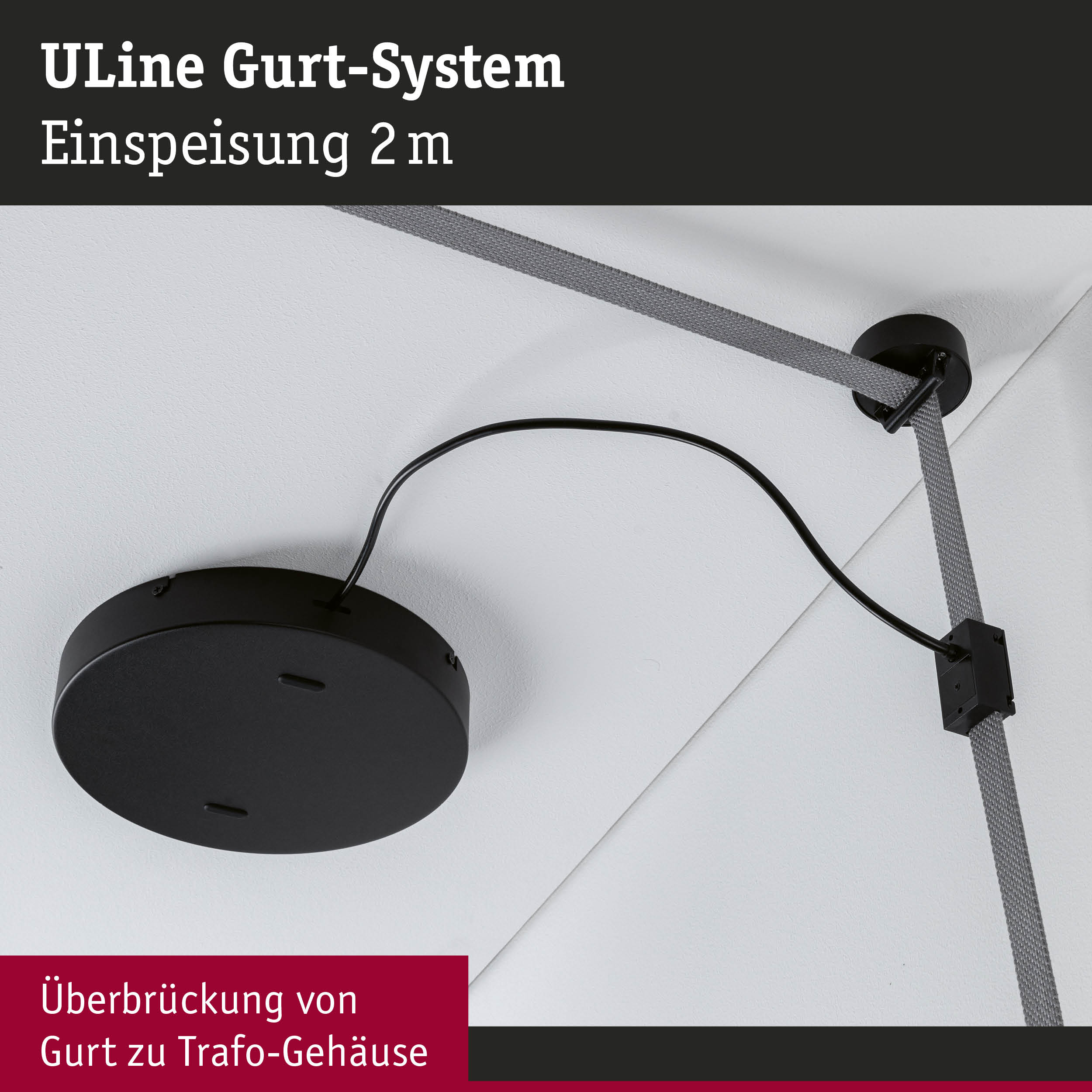 Schwarzes ULine Gurt-System mit grauem Gurt zur Einspeisung an der Decke, Kabel sichtbar