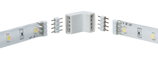 White 12V LED strip with flexible plastic corner connector for lighting installations