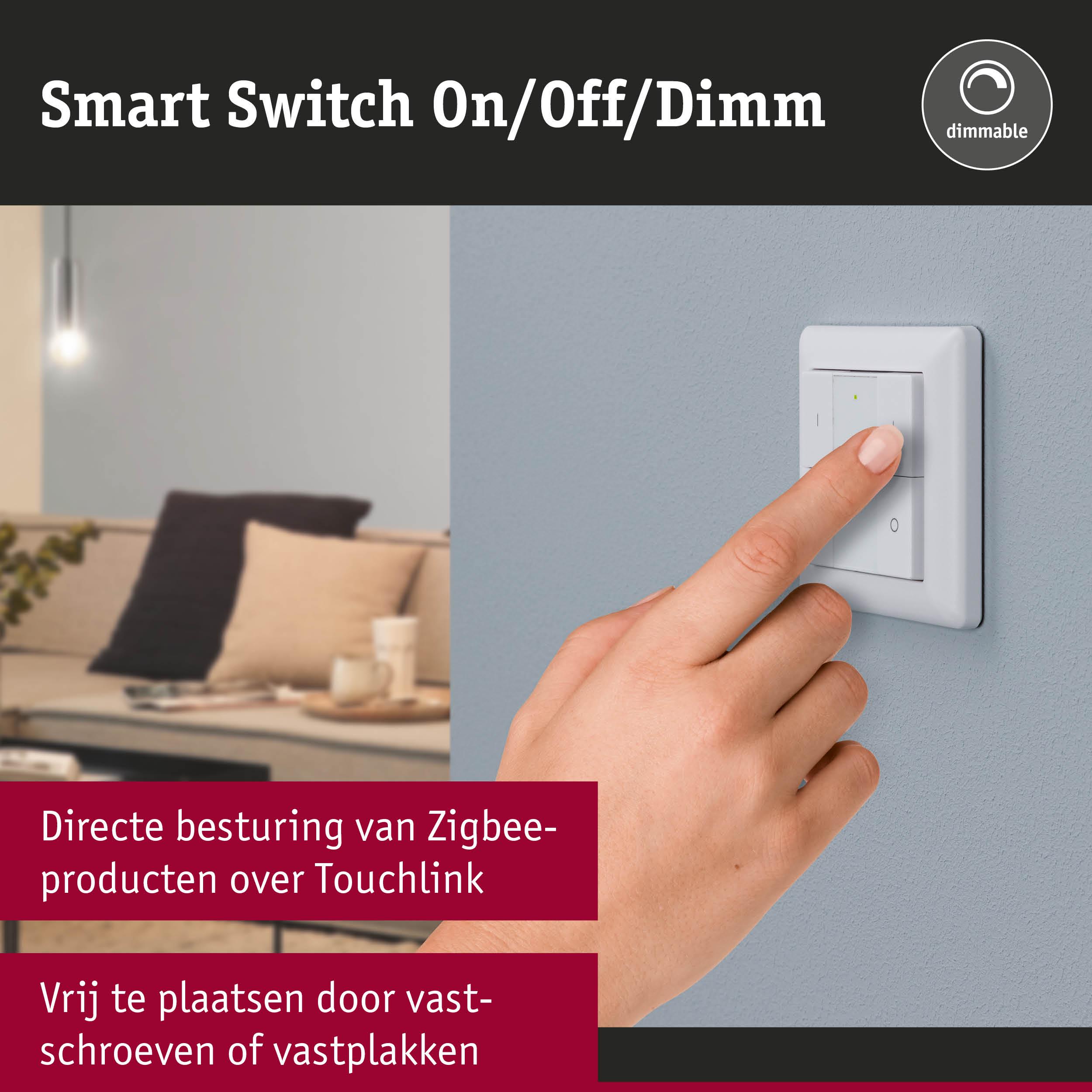 Witte slimme schakelaar voor aan/uit en dimmen op grijze muur met handbediening