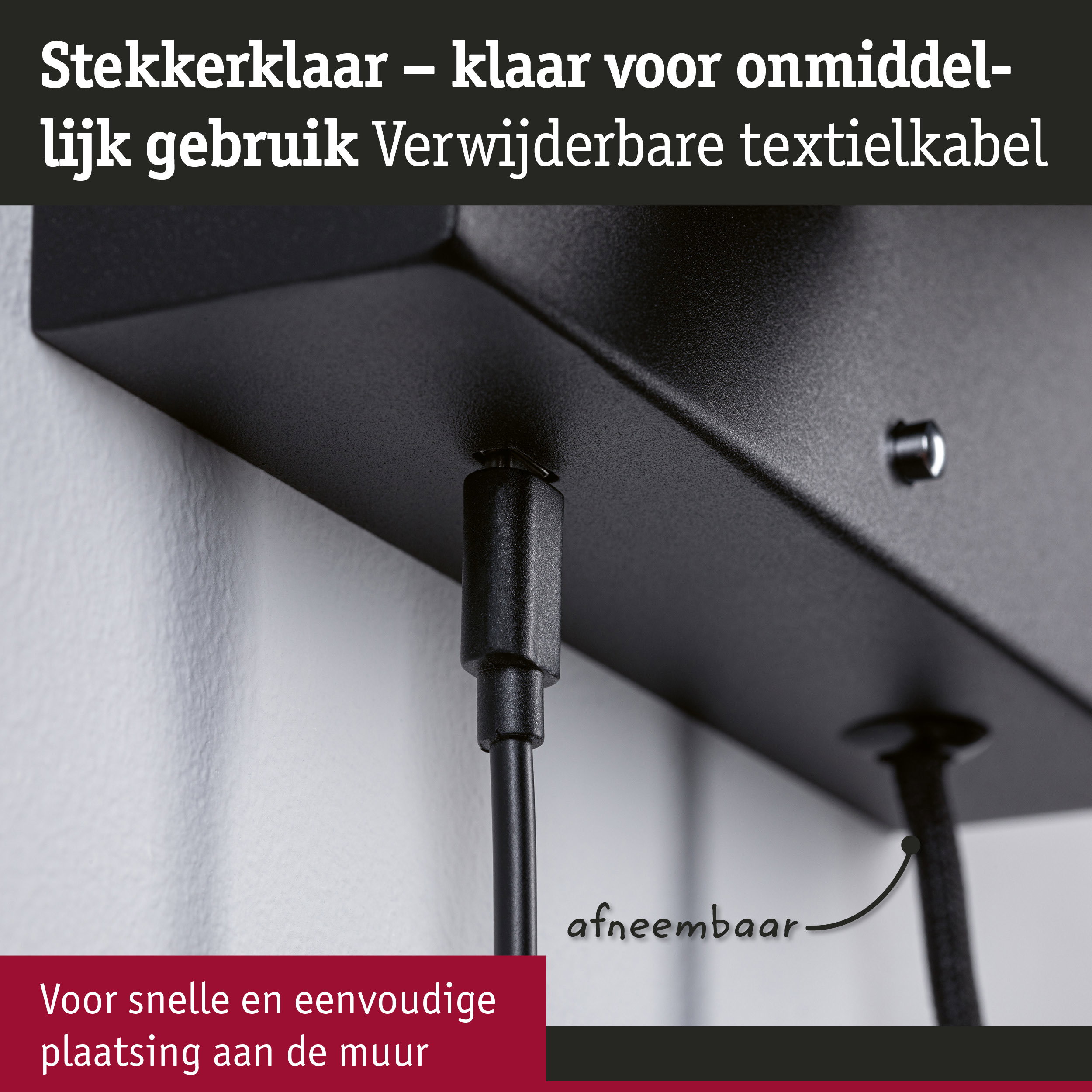Zwarte stekkerdoos met afneembaar textielkabel voor snelle wandmontage en flexibel gebruik