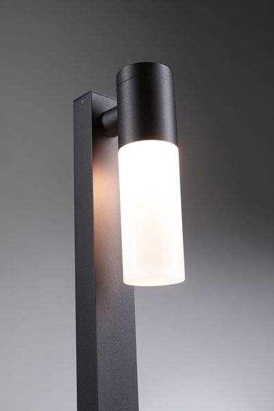 Modern black metal outdoor wall light with white glass and LED lighting for garden and terrace