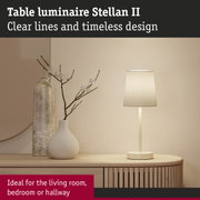 Stellan II cream table lamp with fabric shade on wooden sideboard, modern living room lighting