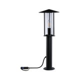 Black outdoor metal lamp with clear glass and visible LED candle bulb for garden lighting