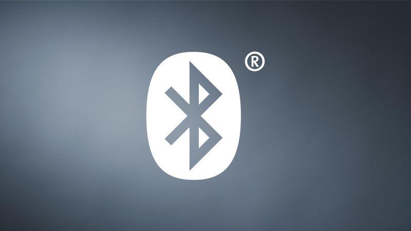 White Bluetooth icon on grey background representing wireless connection and smart home control