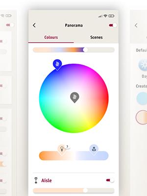 Skærmbillede af Paulmann-app med farvehjul og scenevalg til smart belysningsstyring.