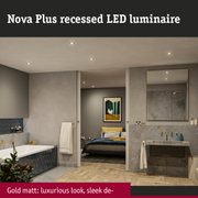 Matt gold Nova Plus recessed LED lights in modern bathroom with grey tiles and wooden parquet floor