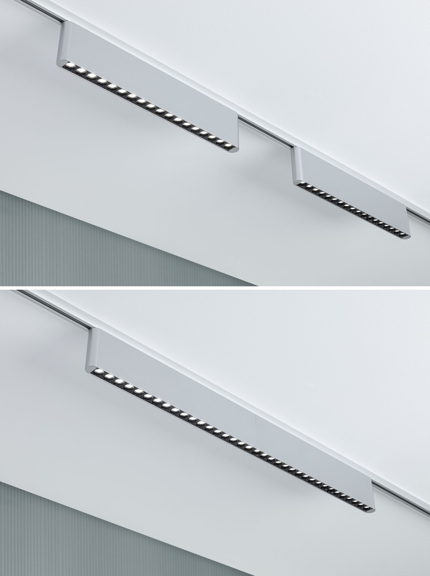 Modern silver aluminium LED track light with multiple small light points mounted on ceiling