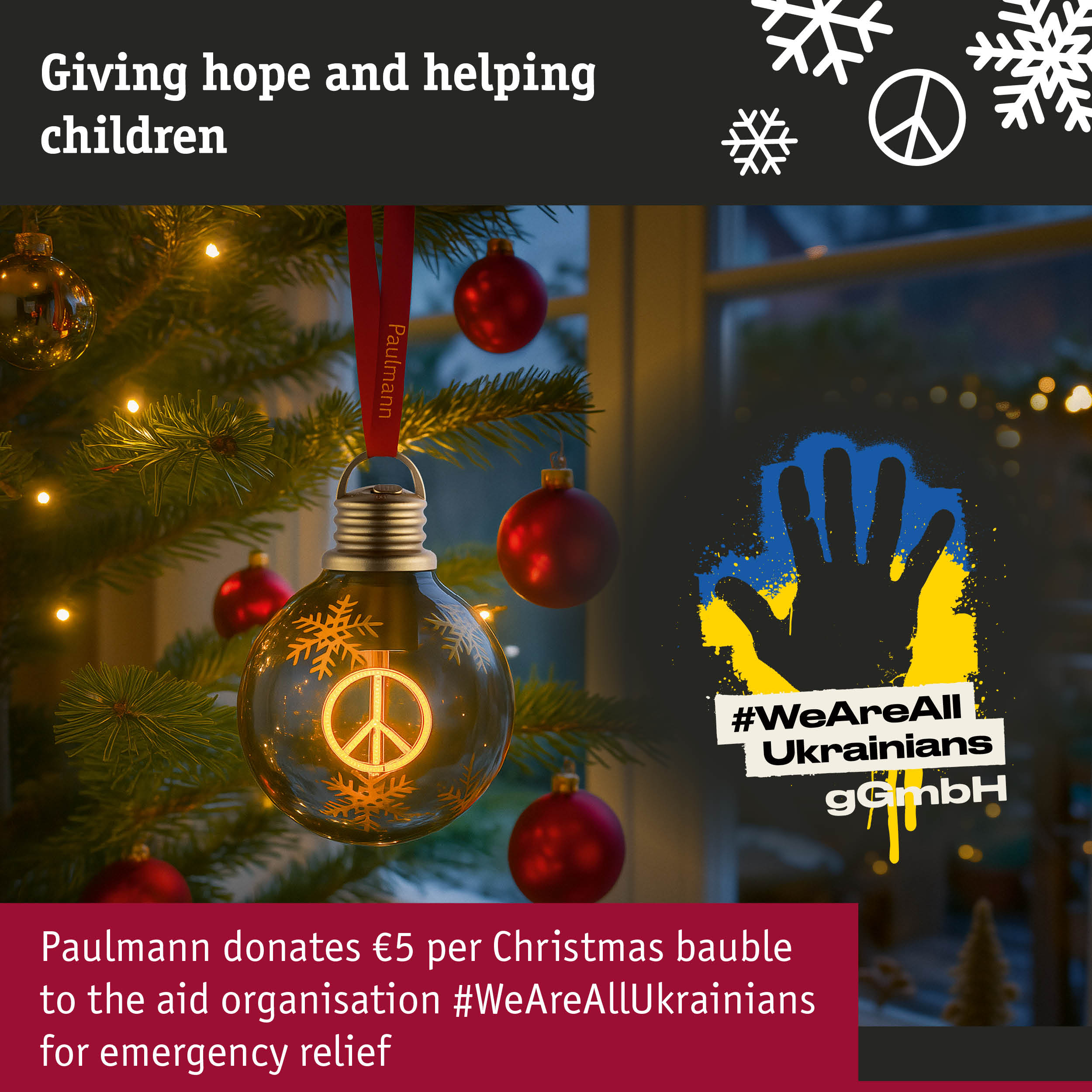 Brown LED Christmas bauble with peace symbol on tree supporting emergency aid for Ukrainians
