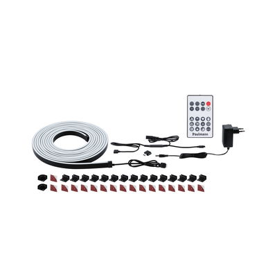 LED light strip with remote, power adapter, and mounting clips in black and white for flexible lighting
