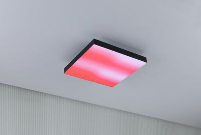 Square ceiling light with black frame and red LED illumination for modern interiors