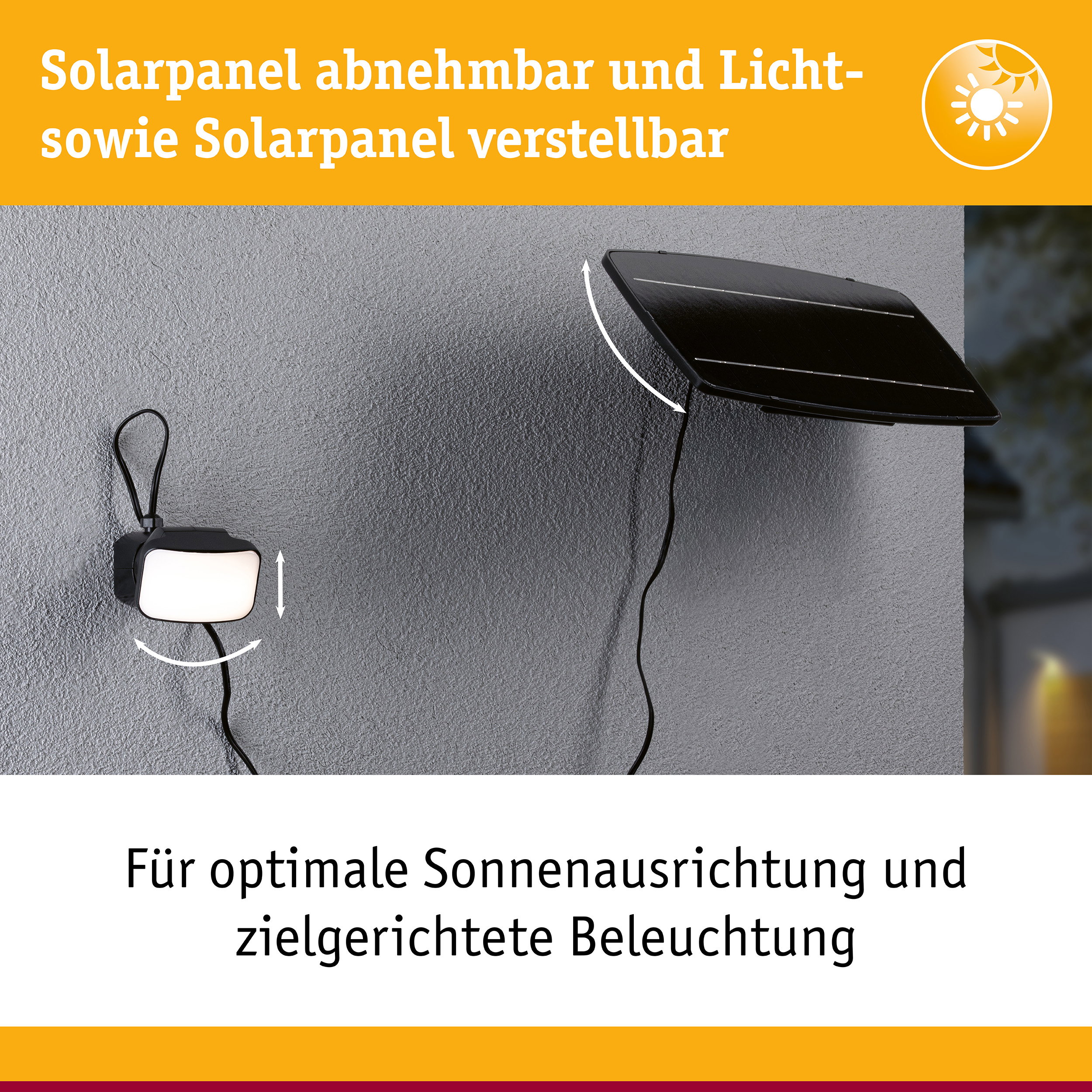 Schwarzes, verstellbares Solarpanel an grauer Wand mit angeschlossener Lampe für gezielte Beleuchtung