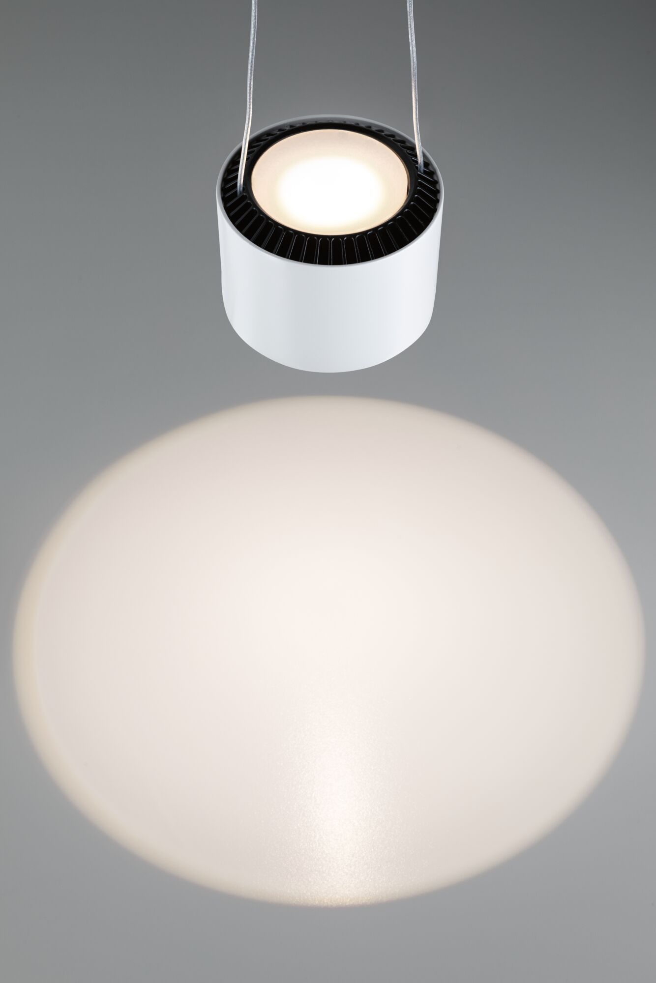 Modern white metal LED pendant light with warm white illumination for living and office spaces