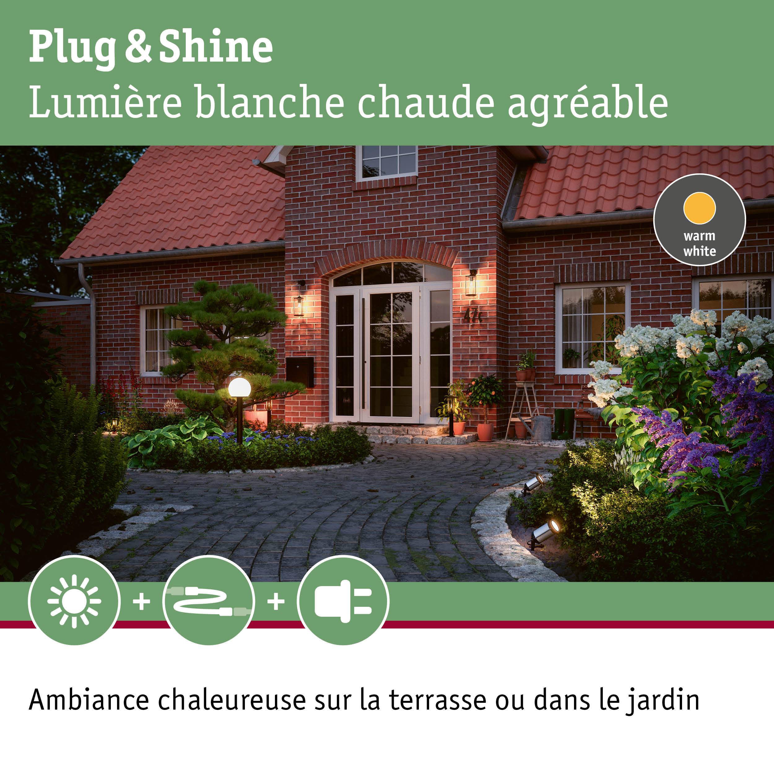Maison en brique éclairée avec lumière extérieure blanc chaud et éclairage de jardin pour terrasse