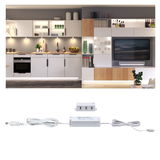 White LED control unit with cable and USB port shown with modern kitchen featuring ambient lighting