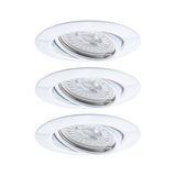 Three white plastic recessed spotlights with LED bulbs for modern indoor lighting solutions