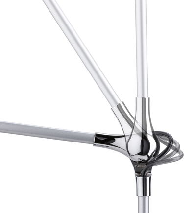 Adjustable silver metal lamp arm with shiny joint for flexible lighting solution