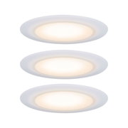 Round white LED recessed light set with warm white glow for modern interior lighting