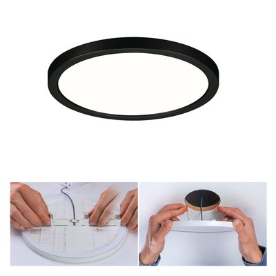 Round LED ceiling light with black frame and white diffuser, installation steps showing spring clips.