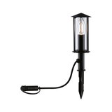 Black outdoor lamp with clear glass and visible LED candle bulb, weatherproof garden light with ground spike