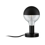 Modern table lamp with black metal base and half-transparent glass head for LED lighting