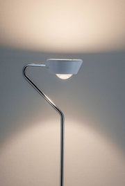 Modern floor lamp with white shade and chrome metal frame for stylish home lighting