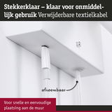 Afneembaar textielkabel aan wit wandapparaat voor snelle en eenvoudige wandmontage