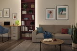 Modern living room with beige sofa, blue armchair, red bookshelf and wooden desk with laptop