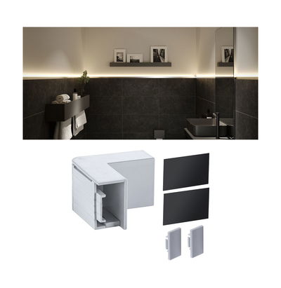 Connecteur d'angle en plastique blanc pour profilé LED mural, éclairage indirect dans salle de bain moderne.