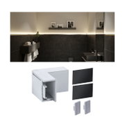White plastic corner connector with black covers for LED aluminum profiles in lighting installation