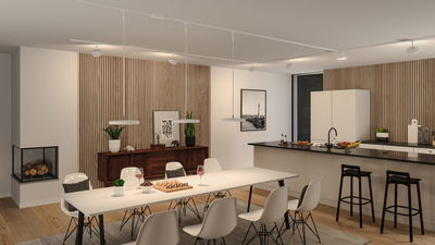 Moderne witte hanglampen boven eettafel in open keuken met hout- en zwarte accenten