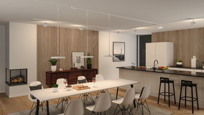 Moderne witte hanglampen boven eettafel in open keuken met hout- en zwarte accenten