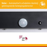 Zwarte zonnebeweging sensor met witte lens voor automatische schakeling, detectiebereik tot 8 meter