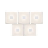 Five square white LED wall lights with central aluminum detail for modern indoor lighting