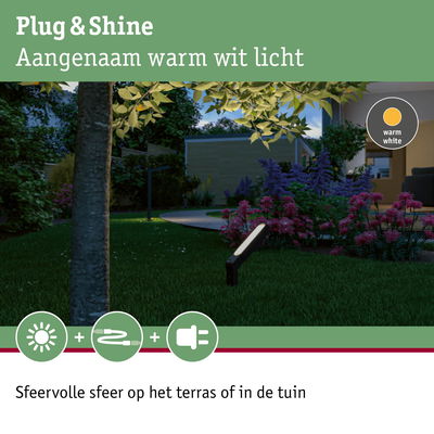 Zwarte buitenlamp met warm wit licht in tuin bij kleurrijke bloemen voor sfeervolle terrasverlichting